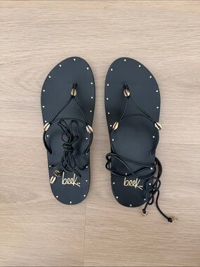 beek Black Leather Lace-Up Sandals with Gold Bead Accents